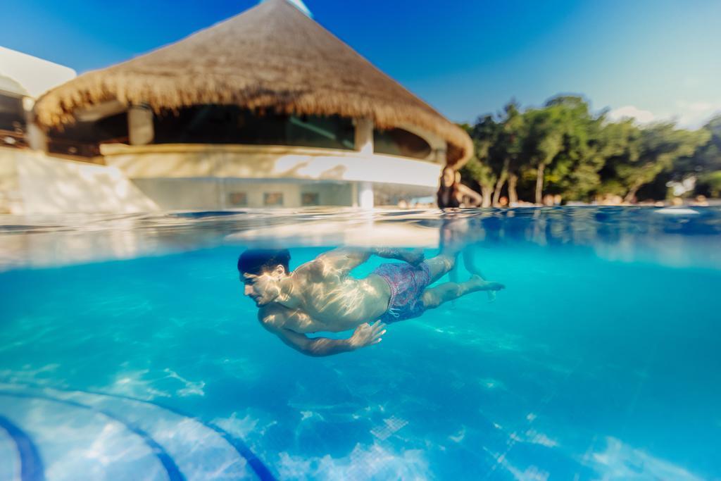 Occidental at Xcaret Destination - All Inclusive Xcaret Park Esterno foto Swimming in a pool