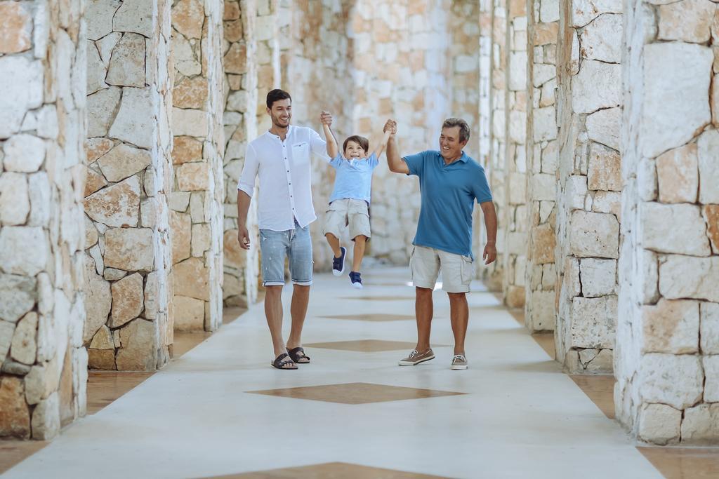 Occidental at Xcaret Destination - All Inclusive Xcaret Park Esterno foto Gay couple with their son